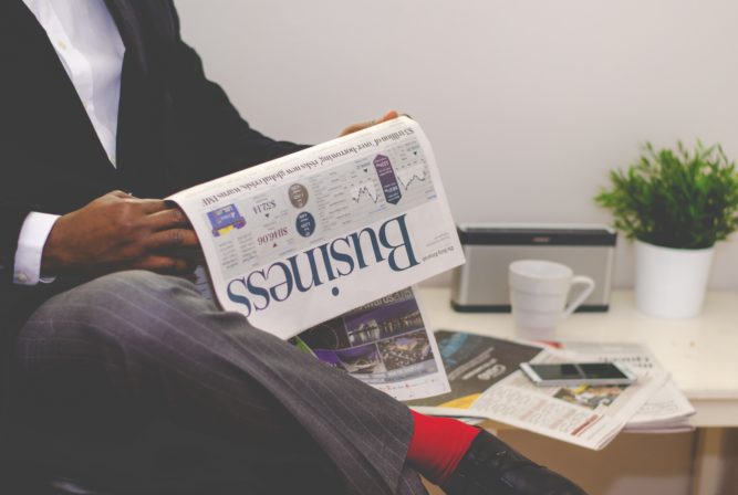 Man reading newspaper